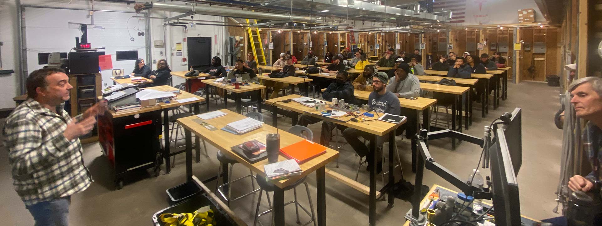 Craig teaching a group of electricians